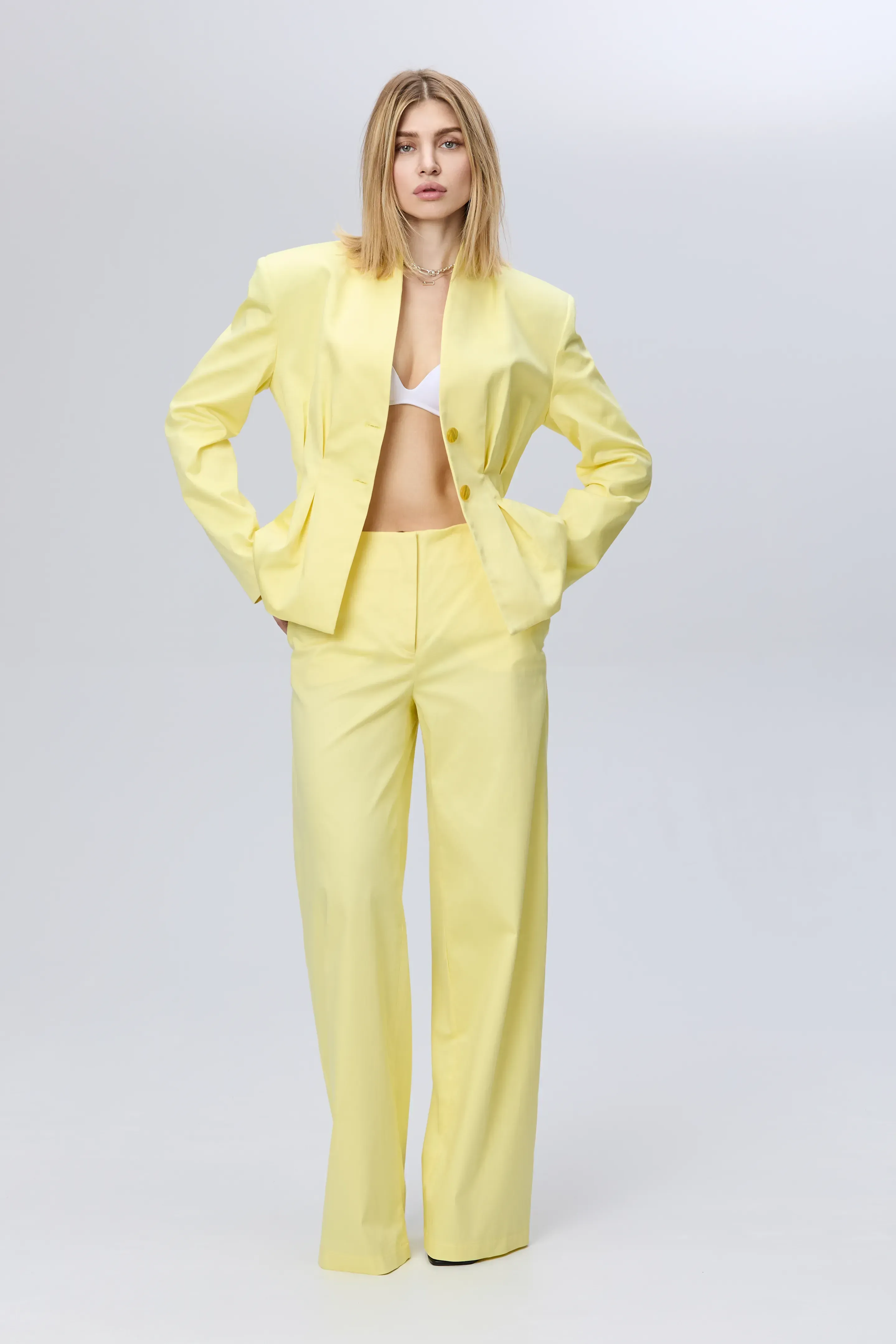 Pantaloni eleganți galbeni din bumbac image