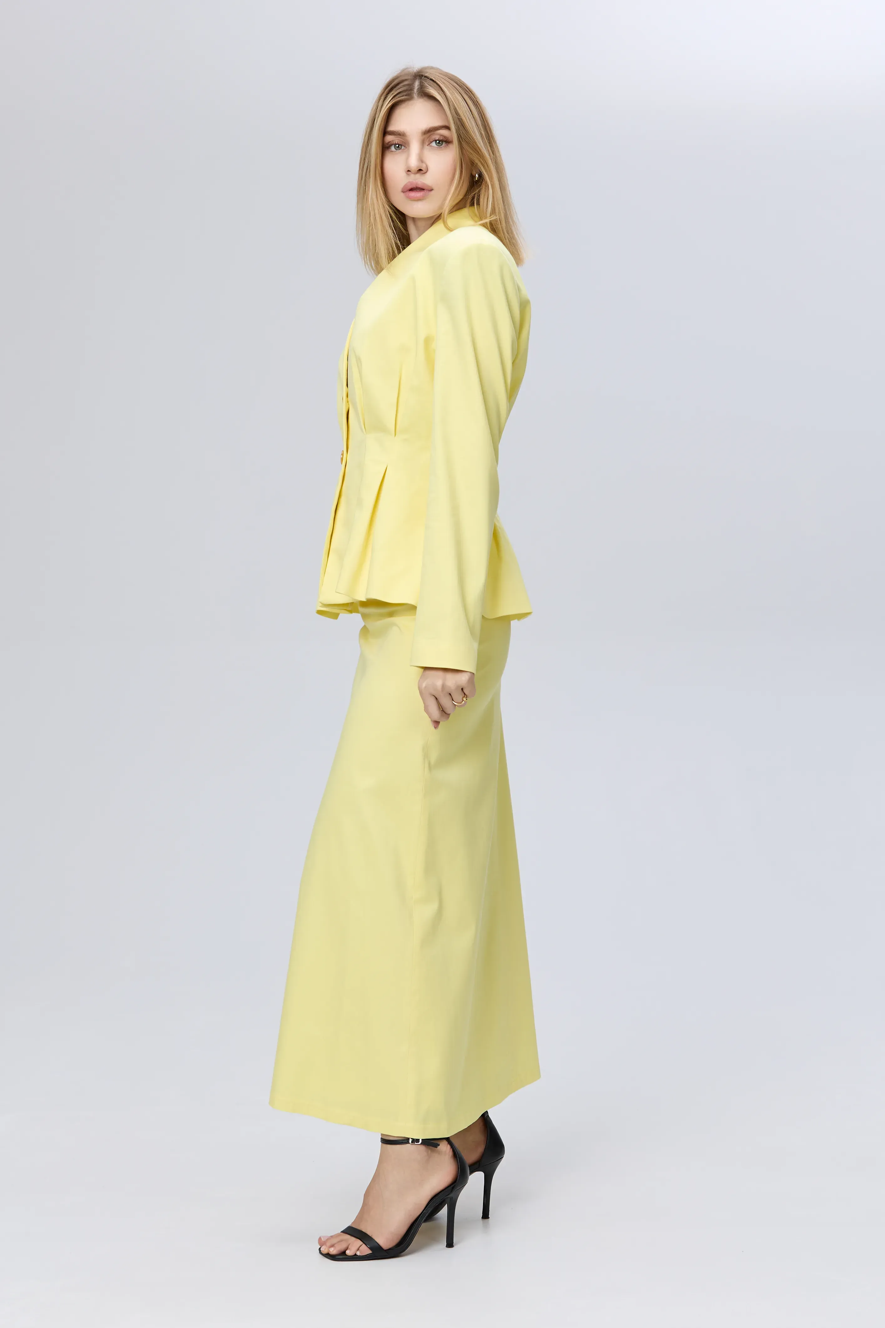 Elegant suit and yellow skirt